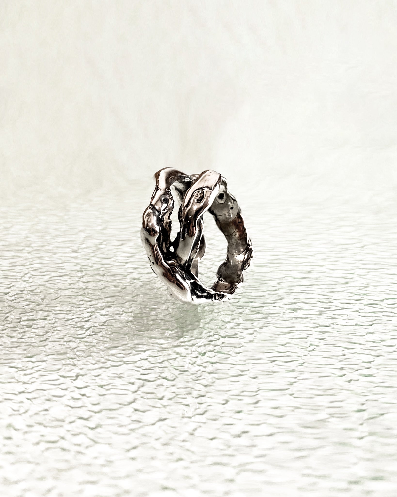 Molten ring in sterling silver side profile