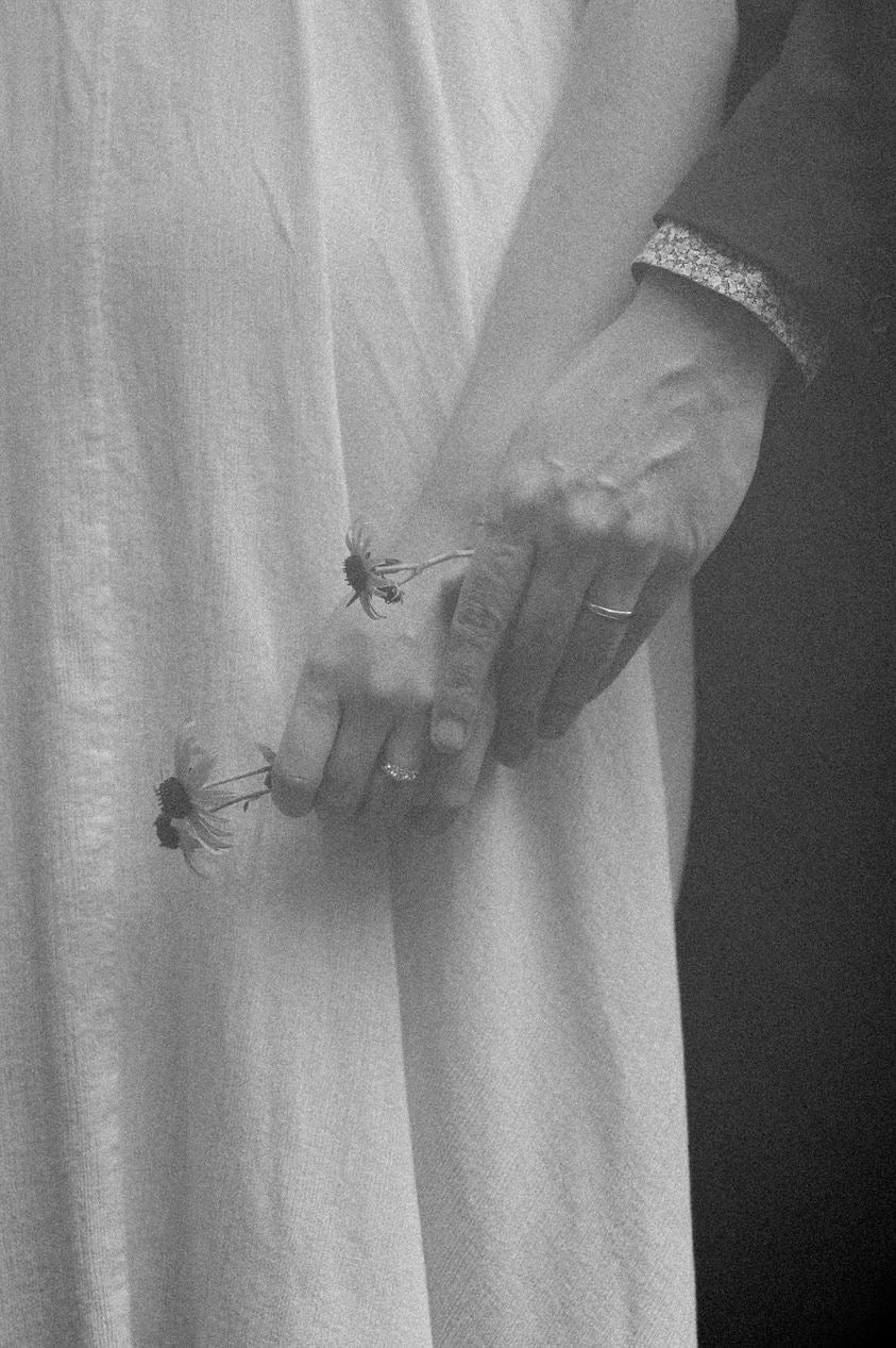 Erin Leydon_Wedding Photo with Couple’s Hands and Wedding Rings
